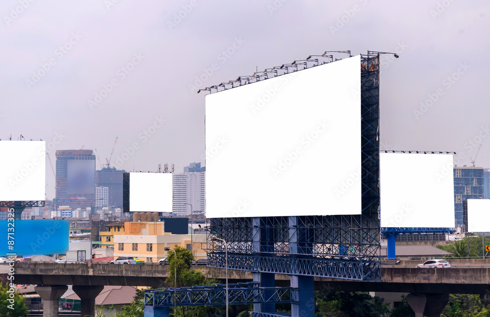 large blank billboard with city view background