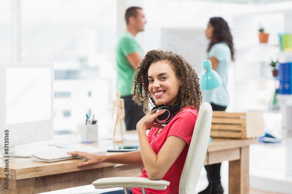 Businesswoman using computer in office