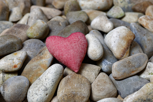 Heart surrounded by stones