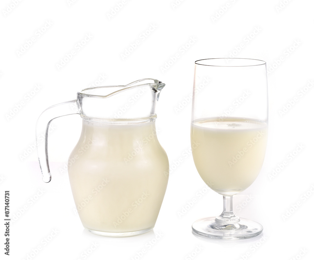 Glass jug pitcher of fresh milk isolated on white background Glass jug pitcher of fresh milk isolated on white background