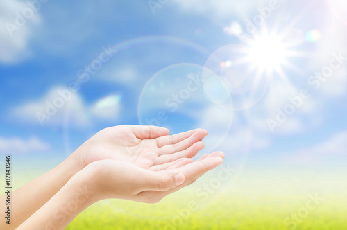 Hand on nature background