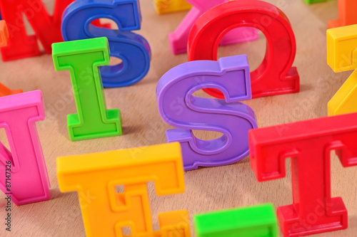 Plastic colorful alphabet letters close up © sss615