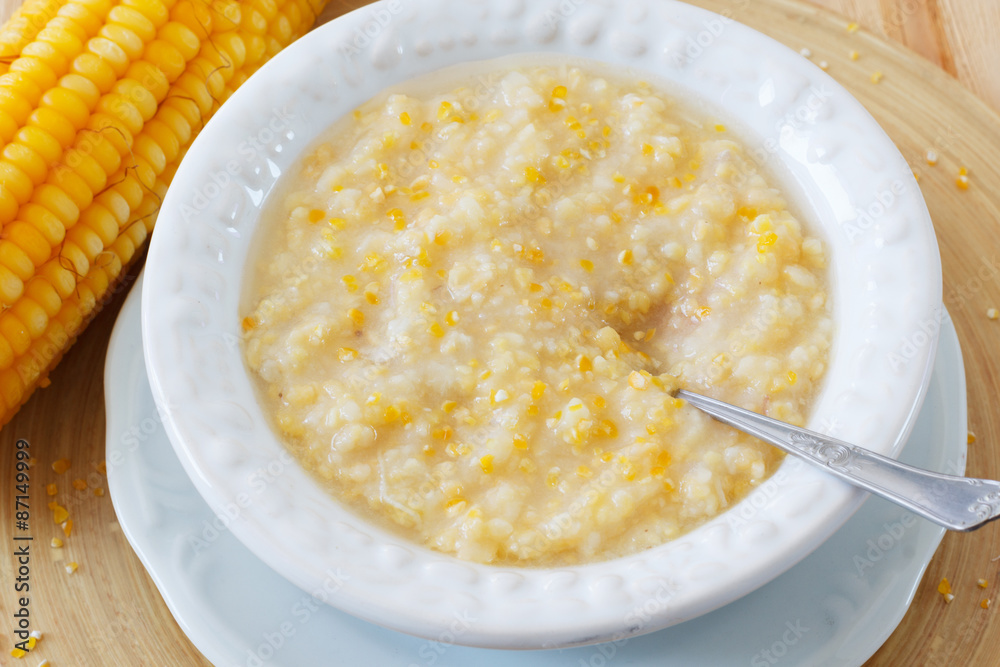 Corn porridge in white plate Corn porridge in white plate