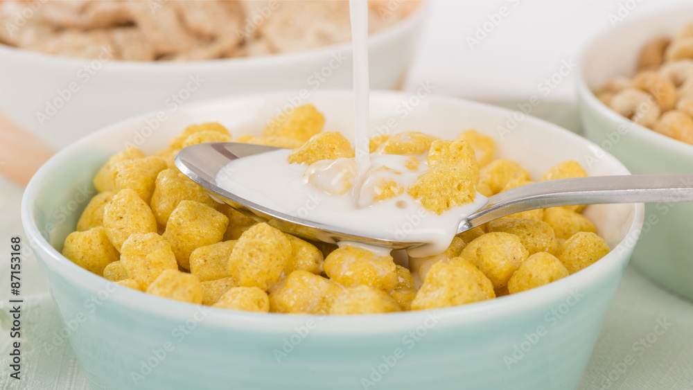 Golden Nuggets - Whole grain cereals in a green bowl.
Golden Nuggets - Whole grain cereals in a green bowl.