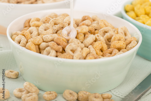 Cheerios - Bowl with cheerios whole grain cereals.
 photo