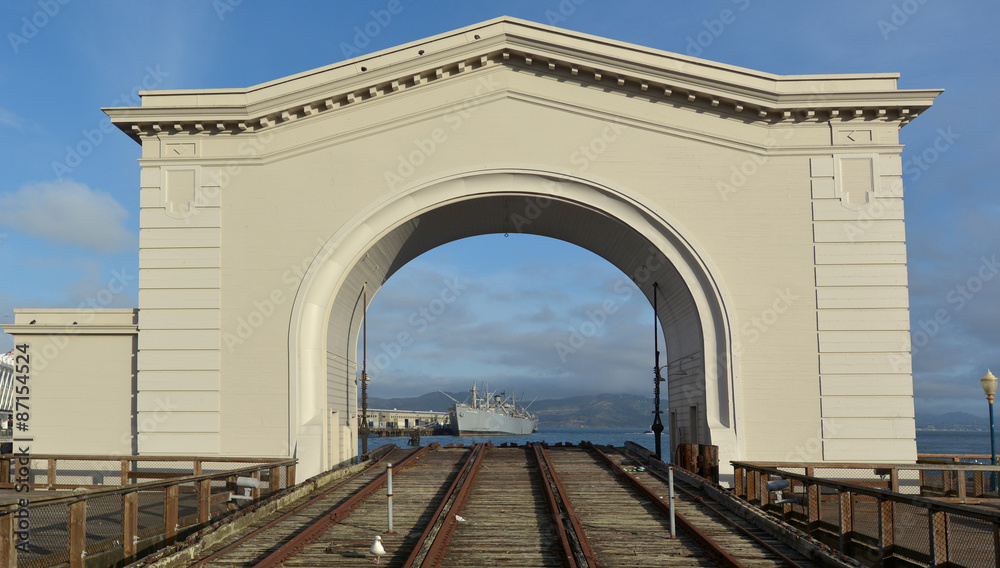 Pier 43 Ferry Arch with Jeremiah O'Brien warship at Pier 45 in F