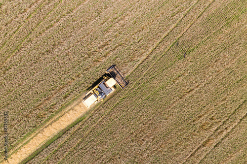 Combine Harvesting a Fall Corn Field Aerial
