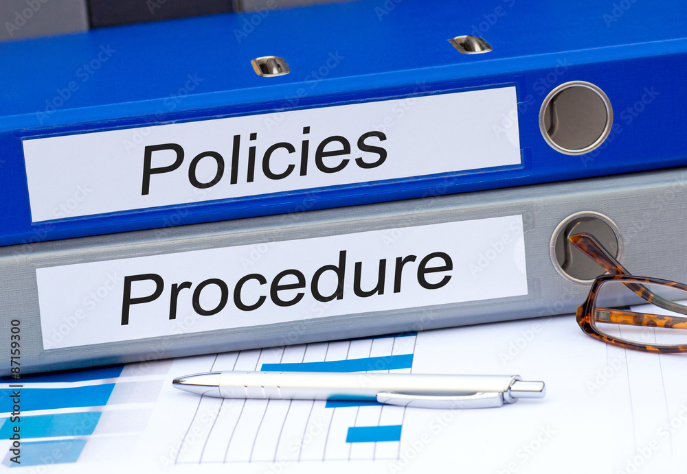 Policies and Procedure - two binders in the office