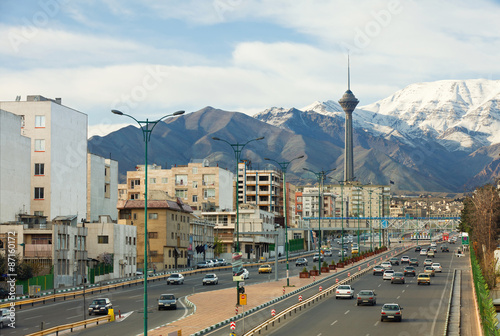 Street View of Tehran with Milad Tower and Alborz Mountains