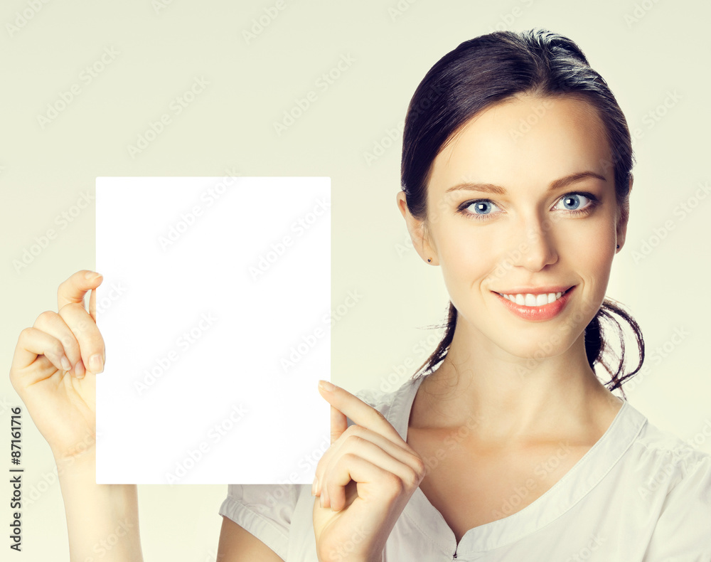 Businesswoman showing blank signboard Businesswoman showing blank signboard