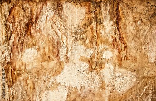 Texture of a stone wall with rust stains