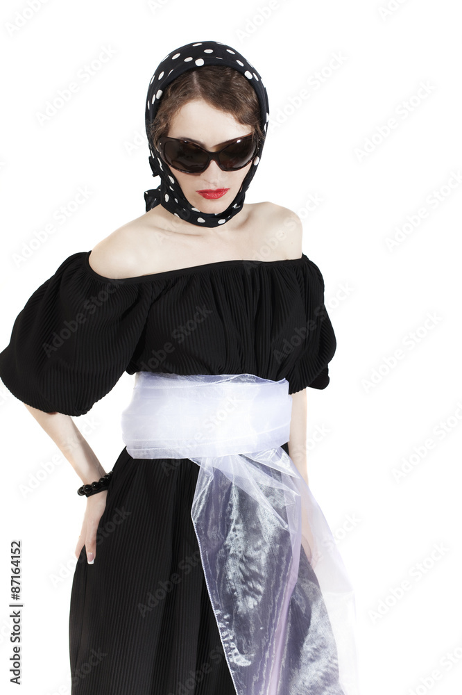 stylish woman wearing headscarf and sunglasses