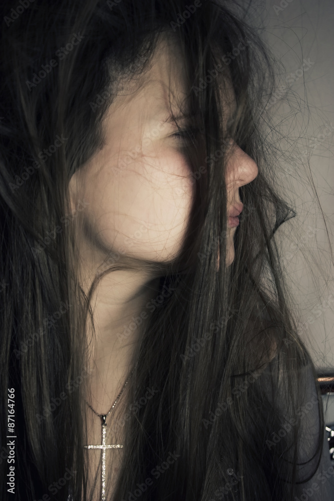 Portrait of the beautiful young girl with long hair Portrait of the beautiful young girl with long hair