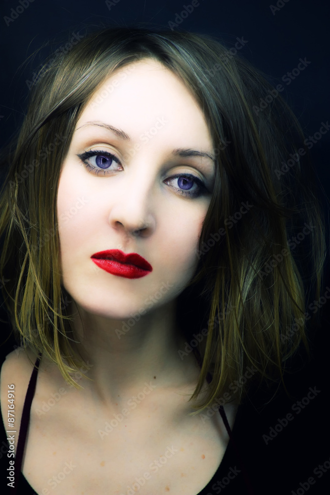 Portrait of the young beauty with violet eyes Portrait of the young beauty with violet eyes