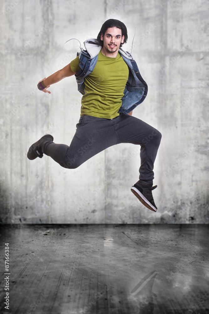 young hip-hop dancer jumping