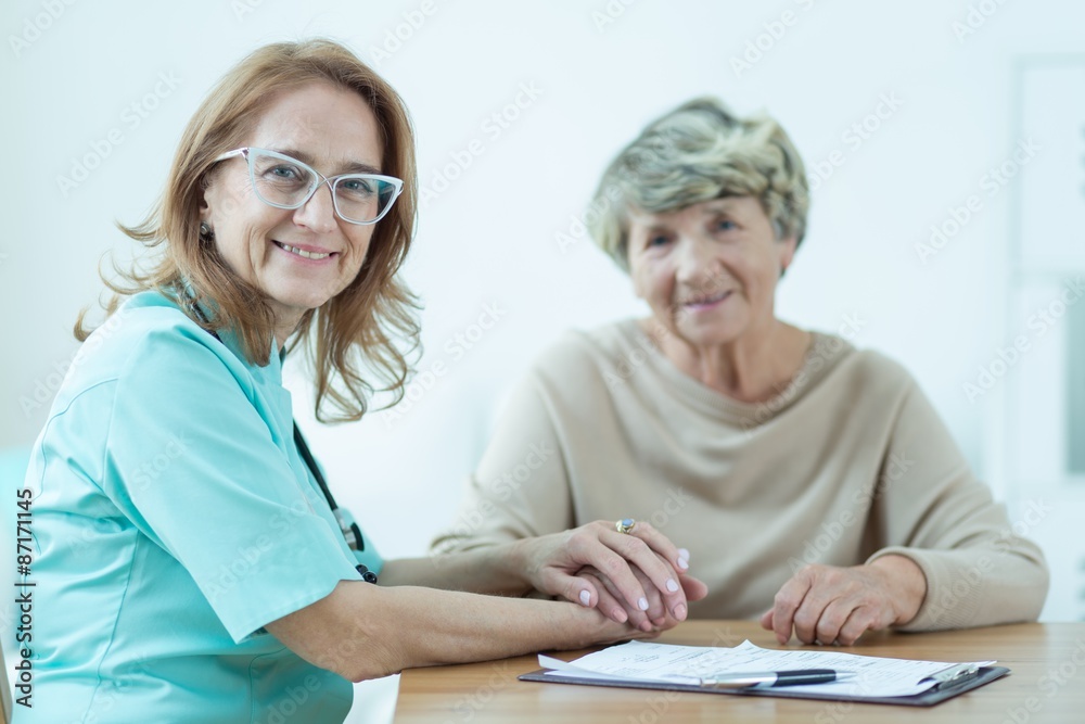 Kind female medic with patient Kind female medic with patient