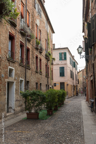 Fototapeta Naklejka Na Ścianę i Meble -  Ancient medieval street in the downtown of Ferrara city
