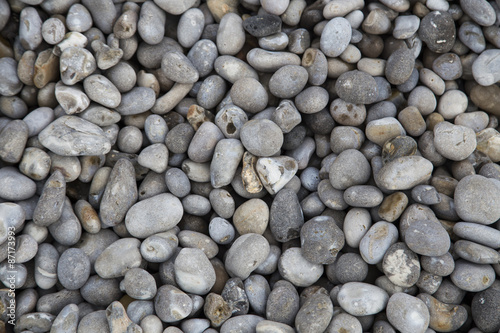colorful multicolored pebbles on seashore