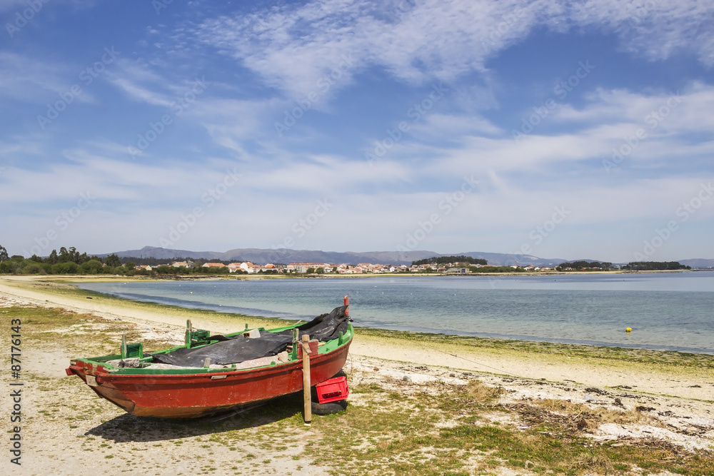 Red boat on the beach