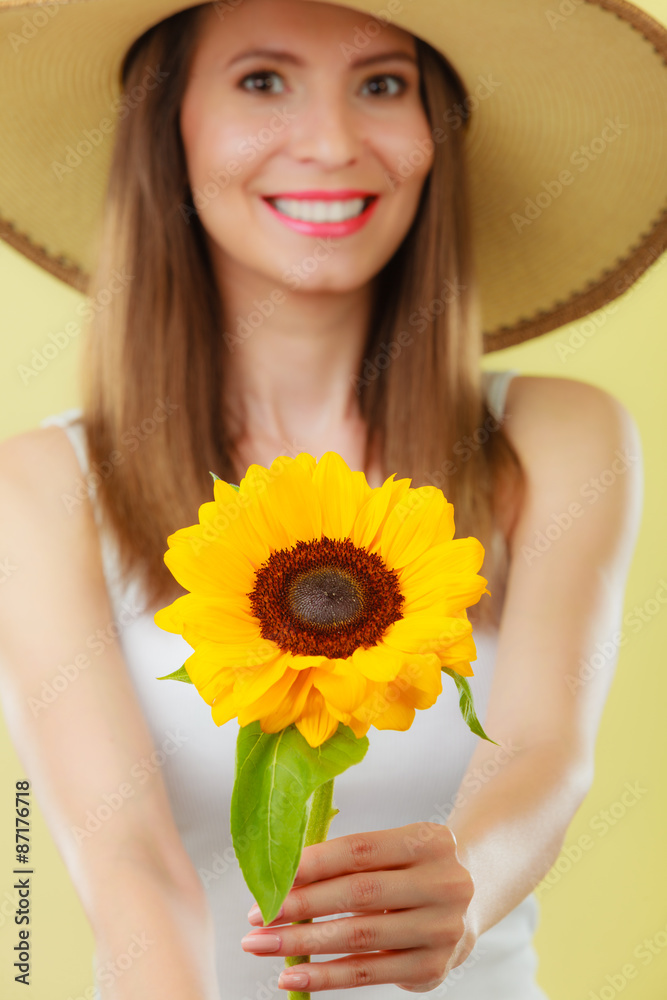 portrait attractive woman with sunflower