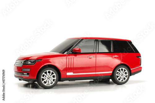 Red vehicle model isolated on the white background