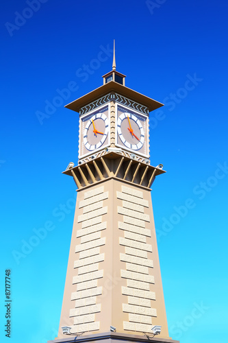 Clock tower in port Dudinka, Taimyr, Russia photo