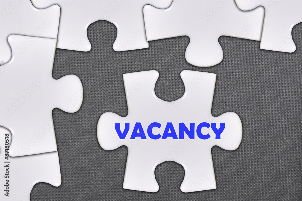 Fototapeta premium jigsaw puzzle written word vacancy