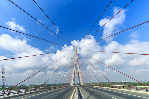Fototapeta Naklejka Na Ścianę i Meble -  Beauty Can Tho bridge over the rope splash in beautiful sky.
 Here is the pride of Vietnam architecture make people's lives more developed thanks to this bridge