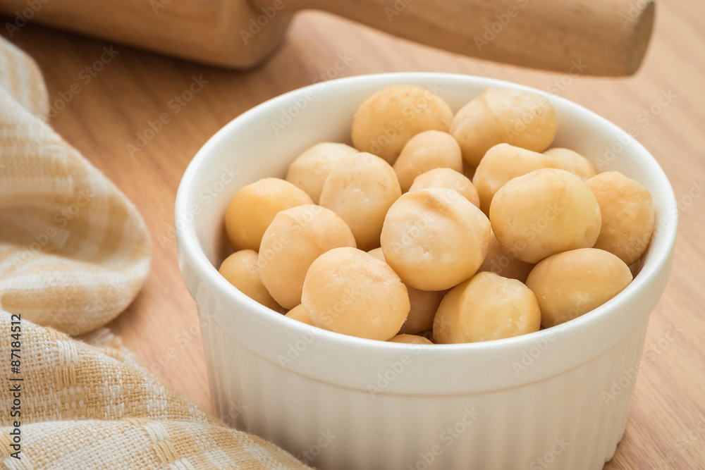 Macadamia nuts in white bowl