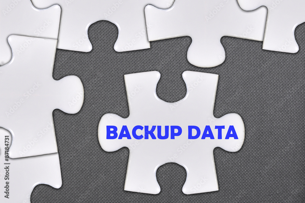 Fototapeta premium jigsaw puzzle written word backup data