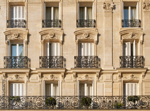 Typical facade of Parisian building near Notre-Dame photo