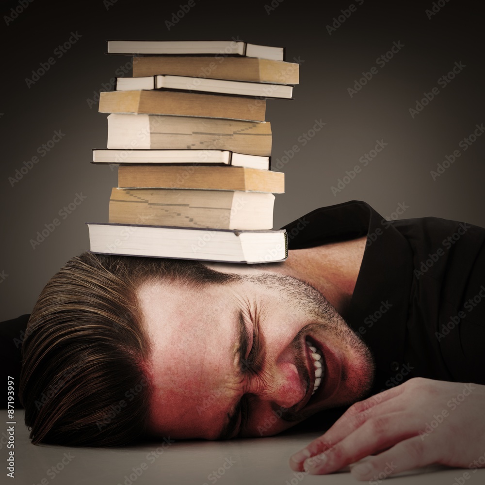 Obraz premium Composite image of stressed businessman banging his head