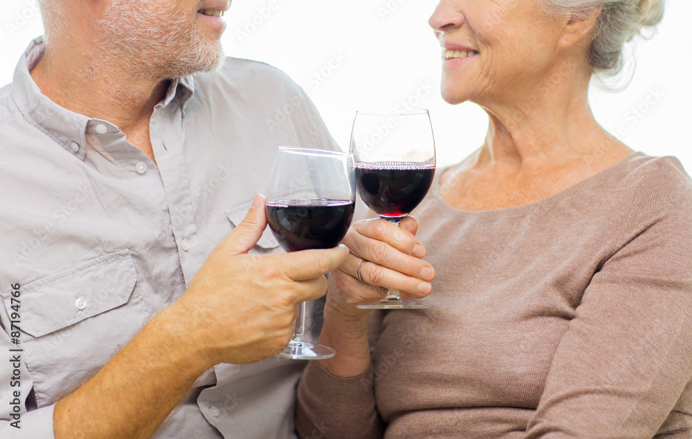 close up of happy senior couple with red wine close up of happy senior couple with red wine