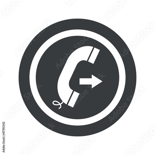Round black outgoing call sign
