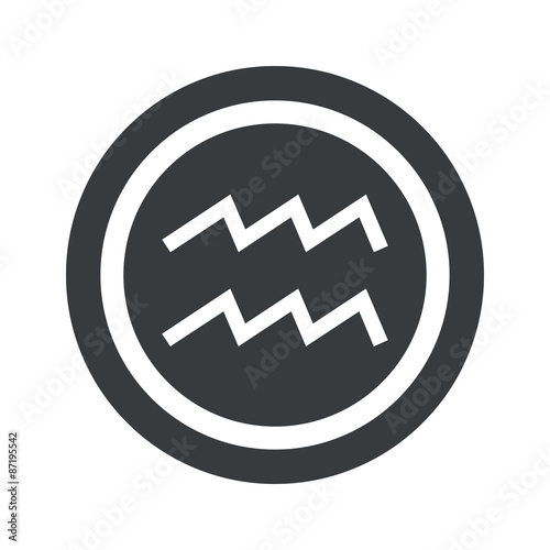 Round black Aquarius sign