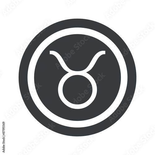 Round black Taurus sign