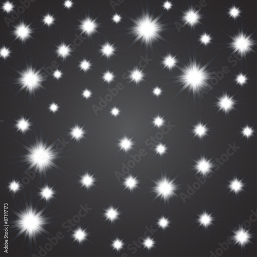 Glittering stars on blue background. Vector illustration. Eps 10