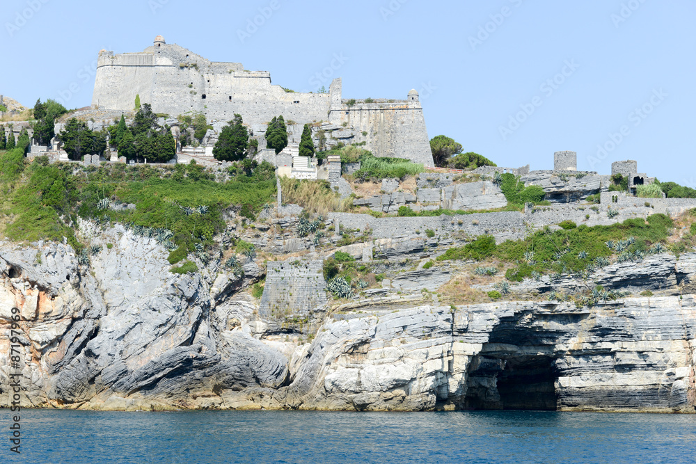 Old fortless on a rocky coastal outcrop at Portovenere, Italy