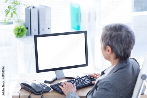 Businesswoman working on computer 