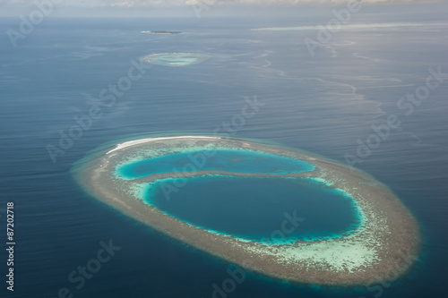 Photography atoll in Indian ocean view from seaplane, Maldives island.