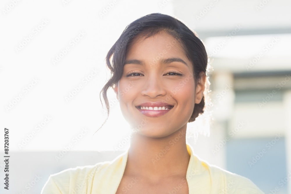  Smiling young businesswoman looking at the camera
