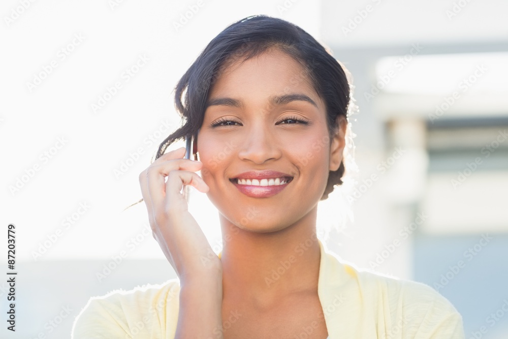  Casual businesswoman talking on phone