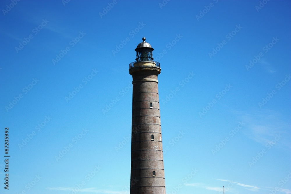 Skagen Lighthouse under blue sky, Denmark