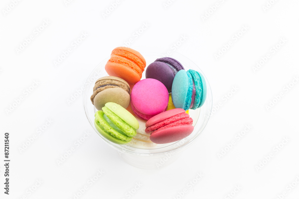 Colorful of Macaron in glass on white background Colorful of Macaron in glass on white background