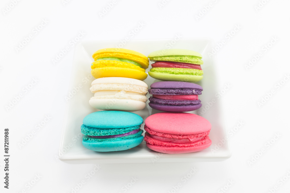 Fototapeta premium Macaron in plate on white background.