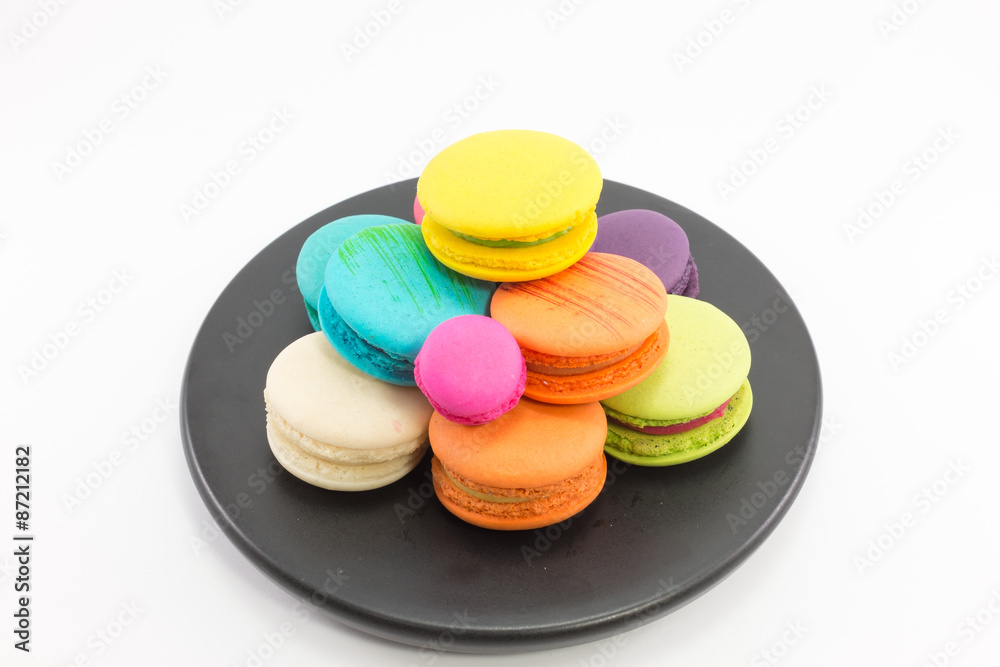Macaron in plate on white background. Macaron in plate on white background.