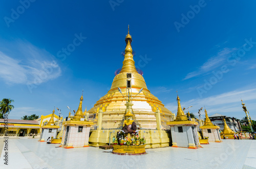 Sacred Bo Ta Tuang pagoda with blue sky background,  Yangon,  My photo