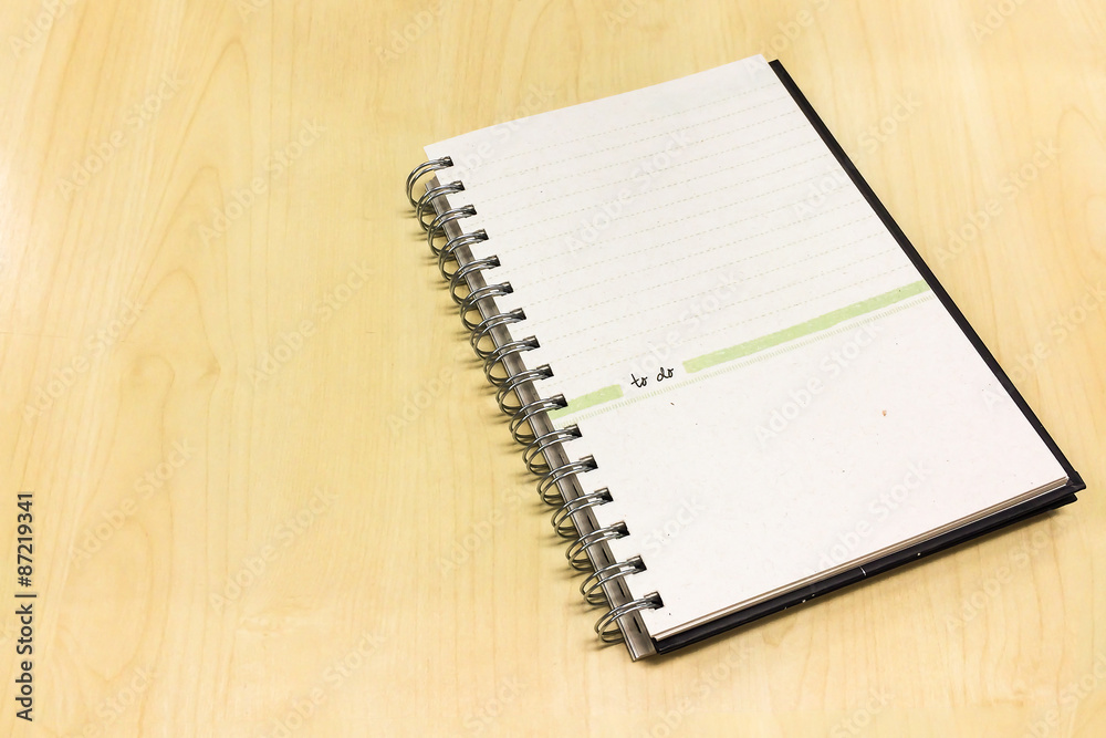 Open Lined Book with Blank Page on Wooden Table Open Lined Book with Blank Page on Wooden Table