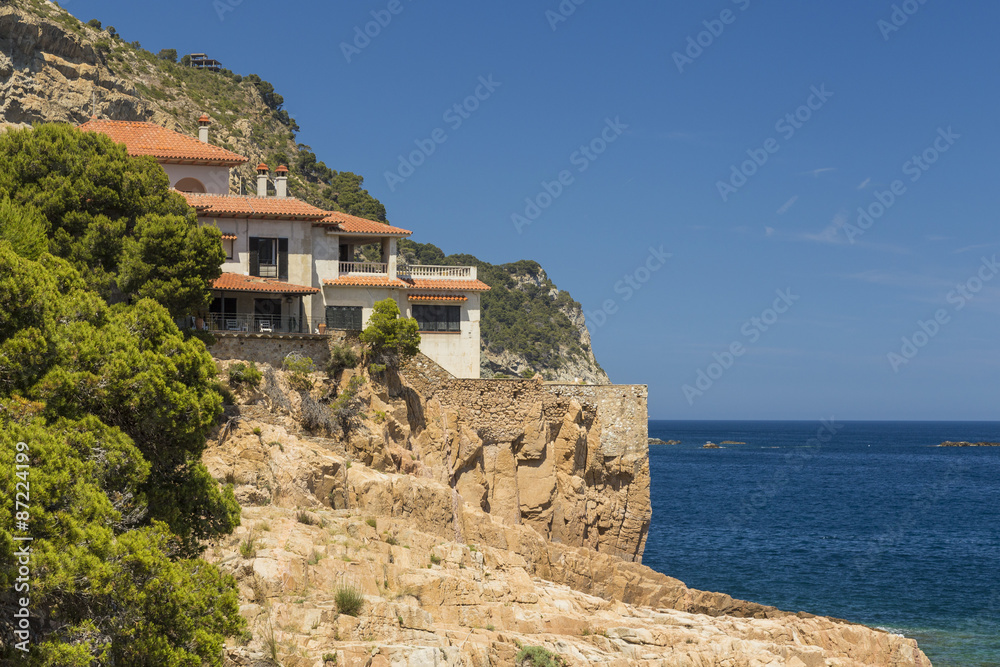 Mediterranean coast house in the cliffs of Costa Brava, Catalonia Mediterranean coast house in the cliffs of Costa Brava, Catalonia