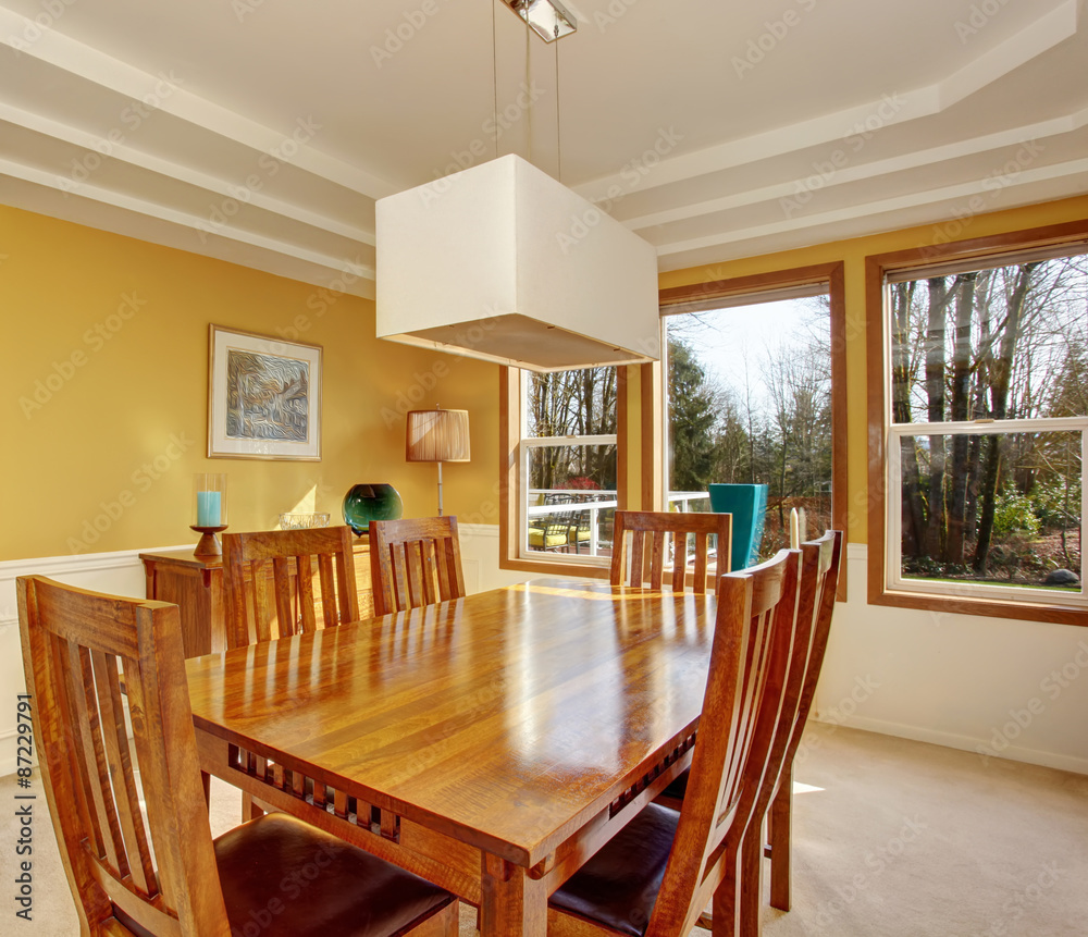 Modernized dinning room with carpet. Modernized dinning room with carpet.